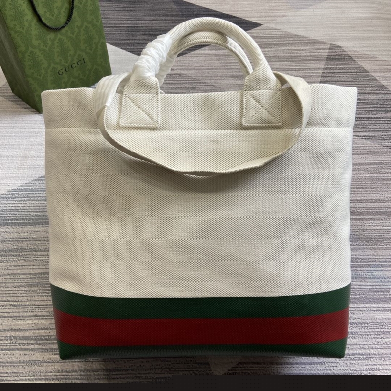 G*u*i shopping bags
